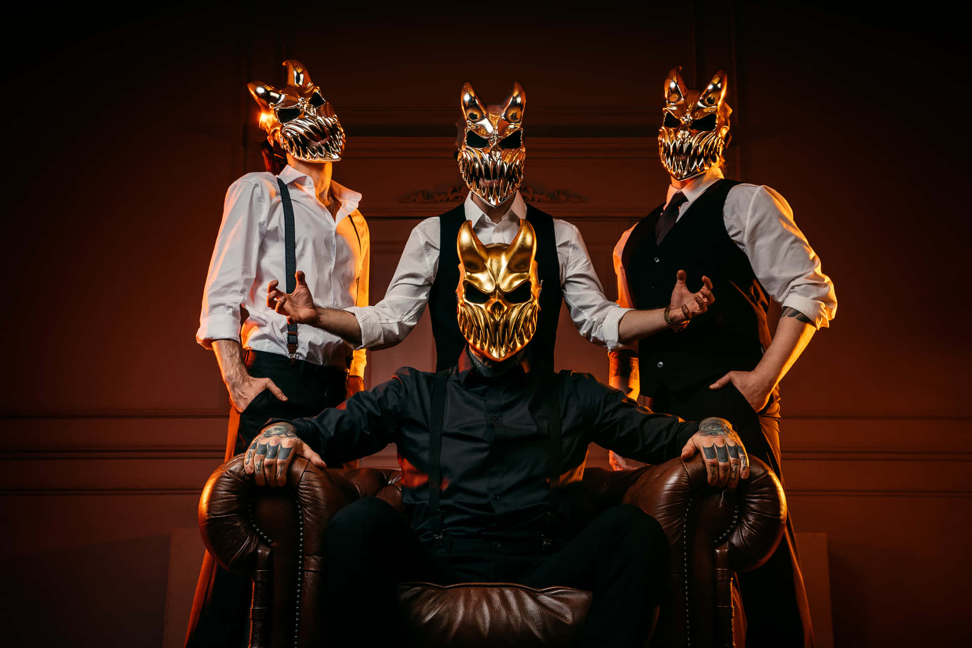 Masked_ Trio_ With_ Golden_ Leader Wallpaper
