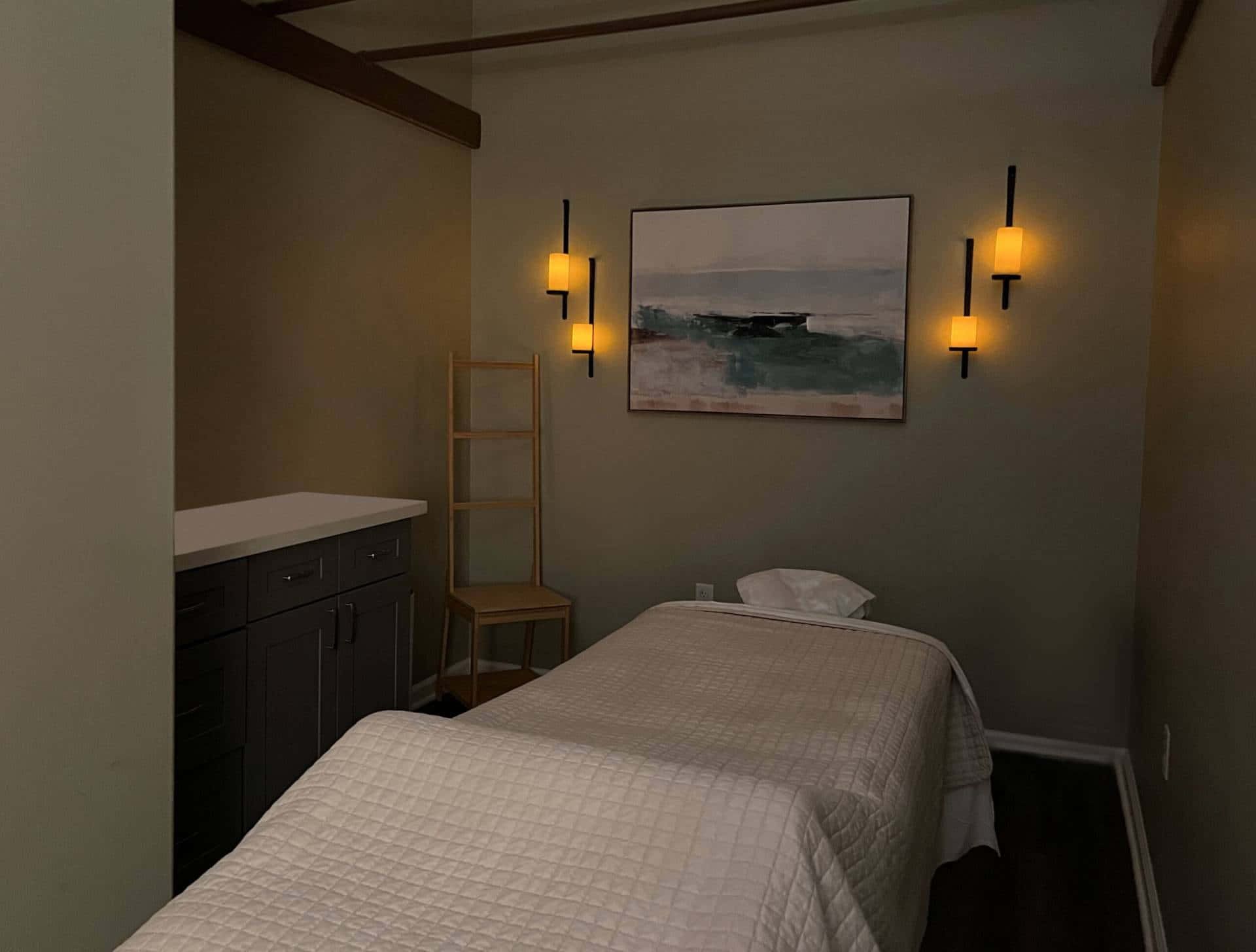 Unwind after a long day in this calming massage room