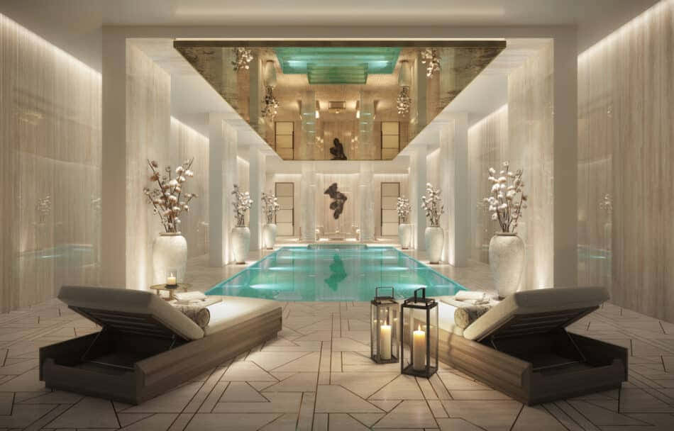 A Swimming Pool With Lounge Chairs And A Chandelier