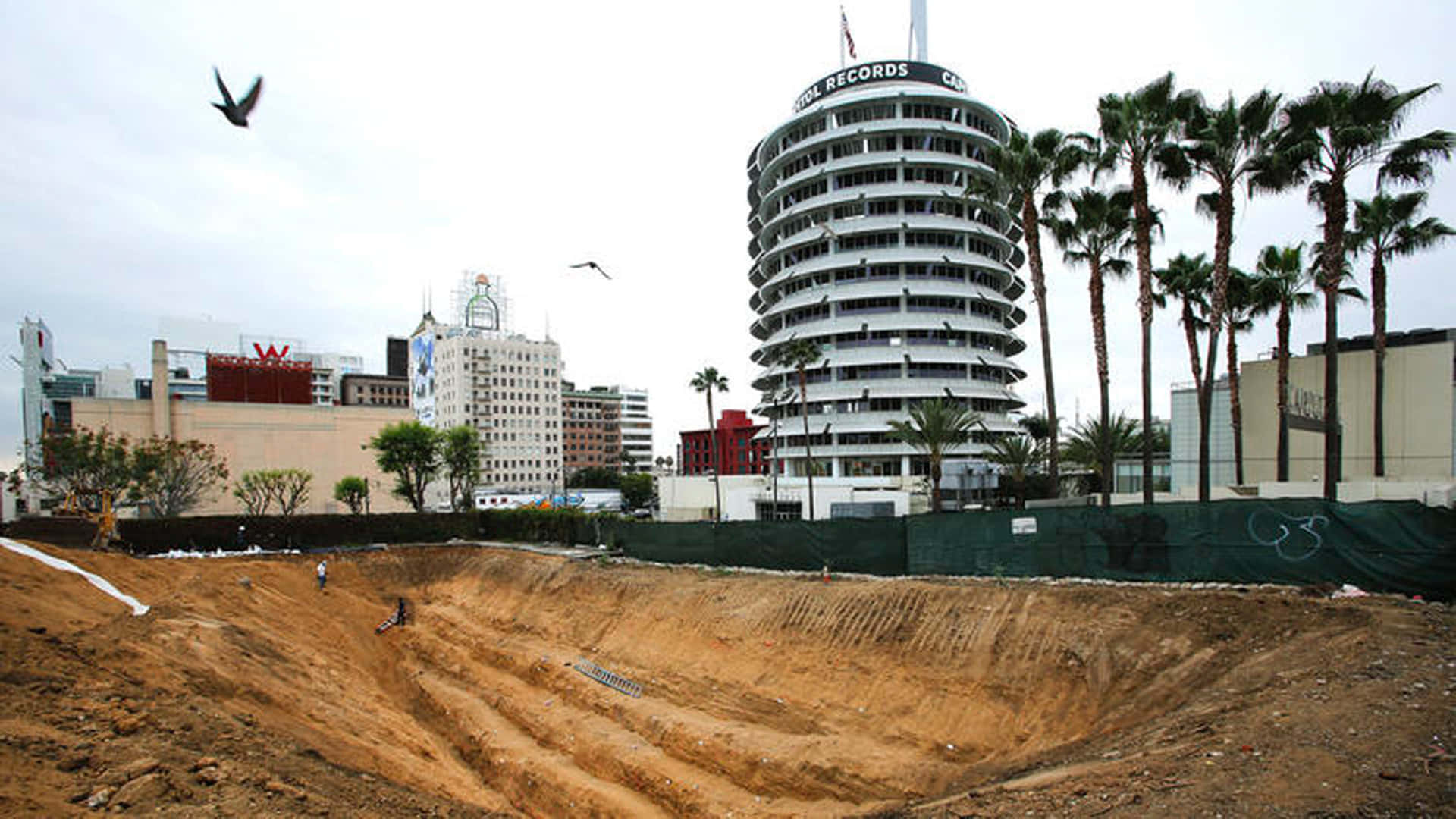 Massive Hole In Front Of Capitol Records Building Wallpaper