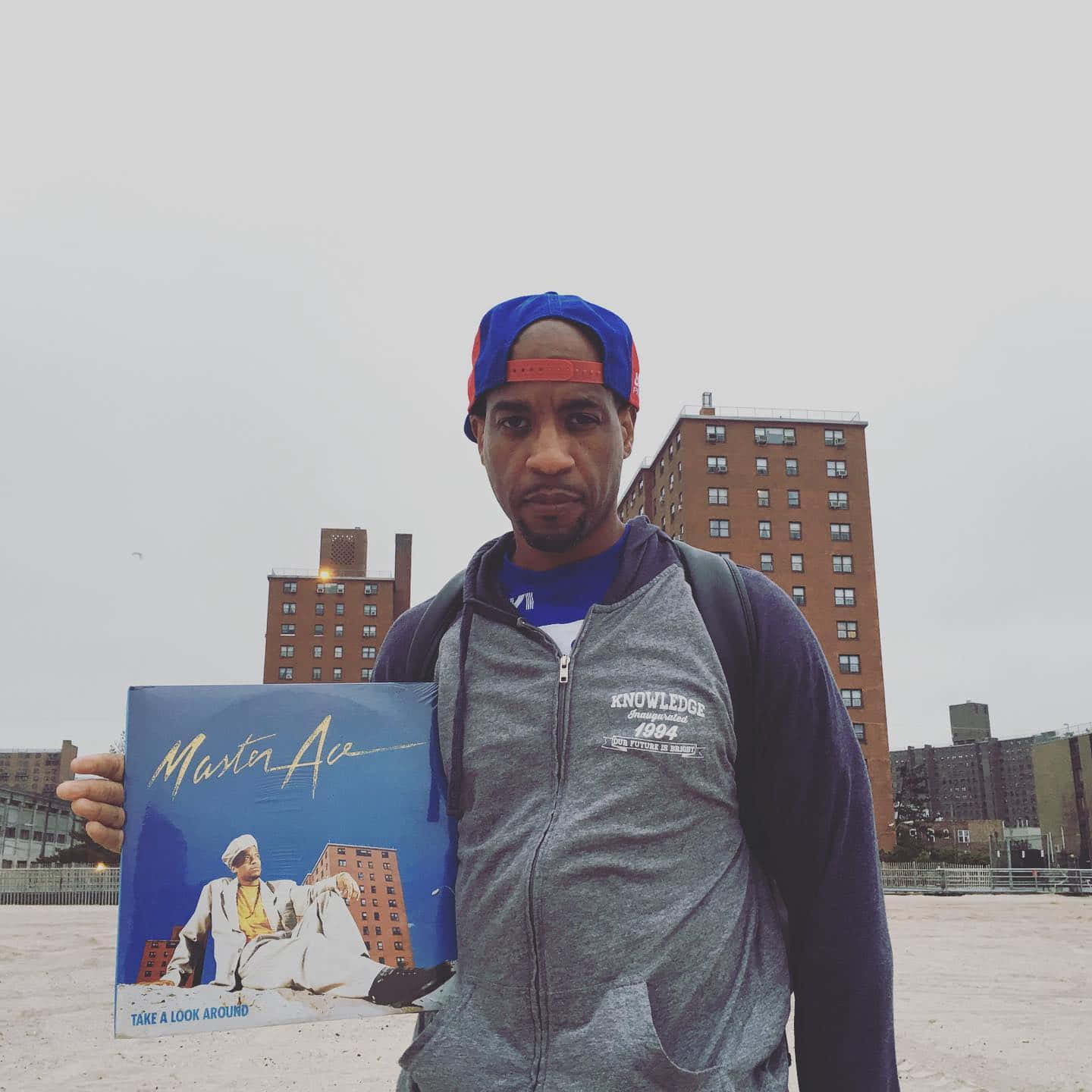 Masta Ace Holding Album Cover Wallpaper