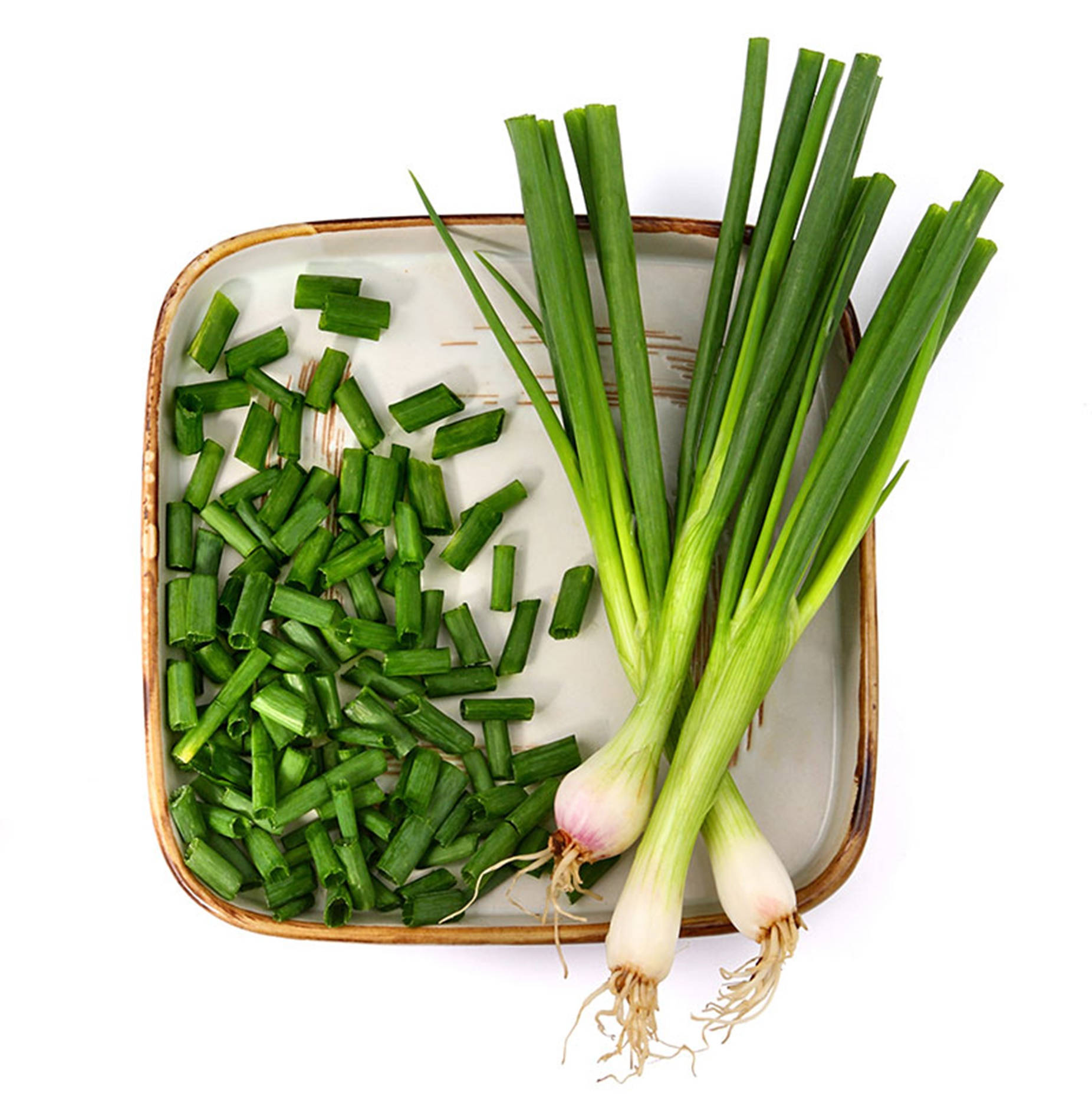 Masterful Flat Lay Whole And Chopped Green Onion Wallpaper