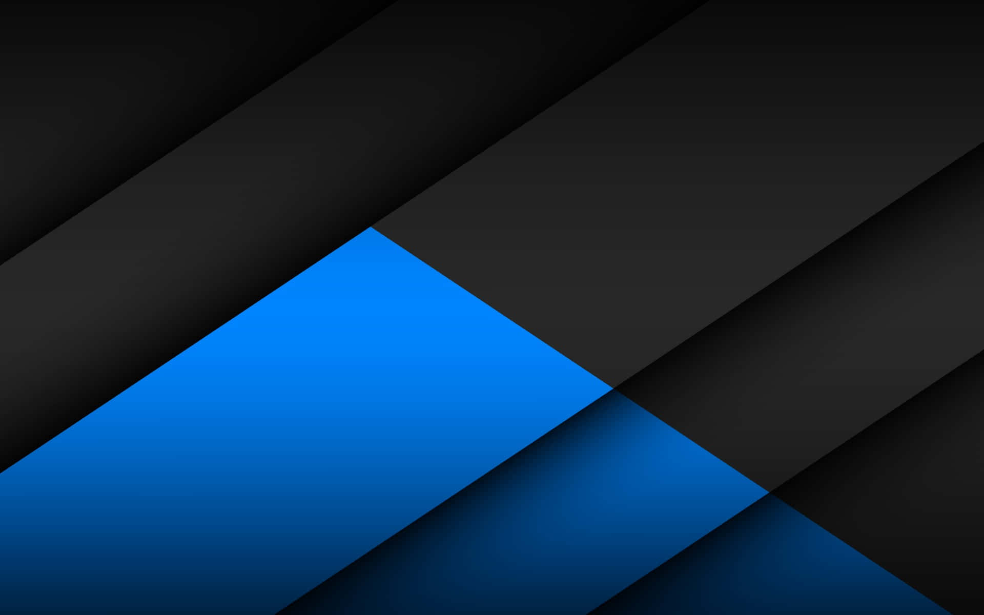 Unfondo Negro Y Azul Con Un Triángulo Azul Y Negro