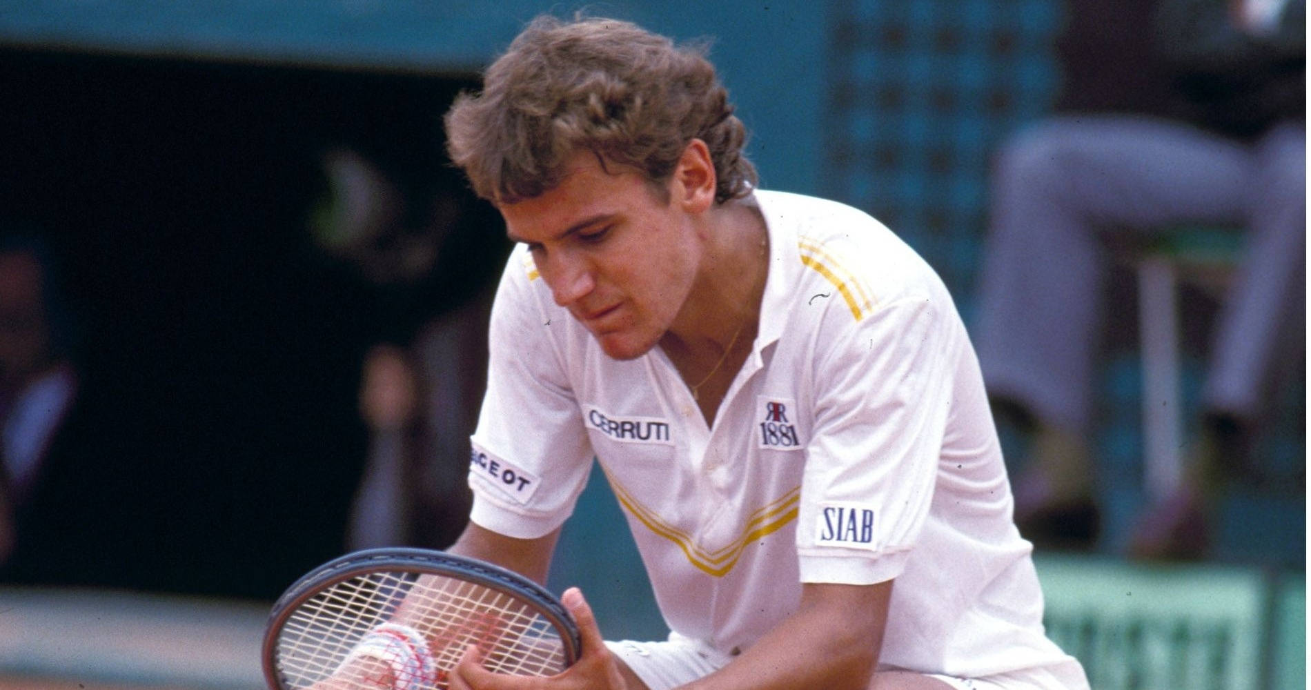 Mats Wilander Inspecting Tennis Racket Wallpaper