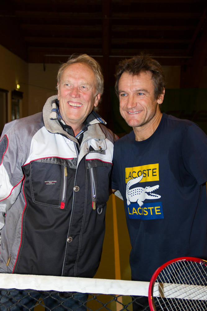 Mats Wilander Smiling With A Fan Wallpaper