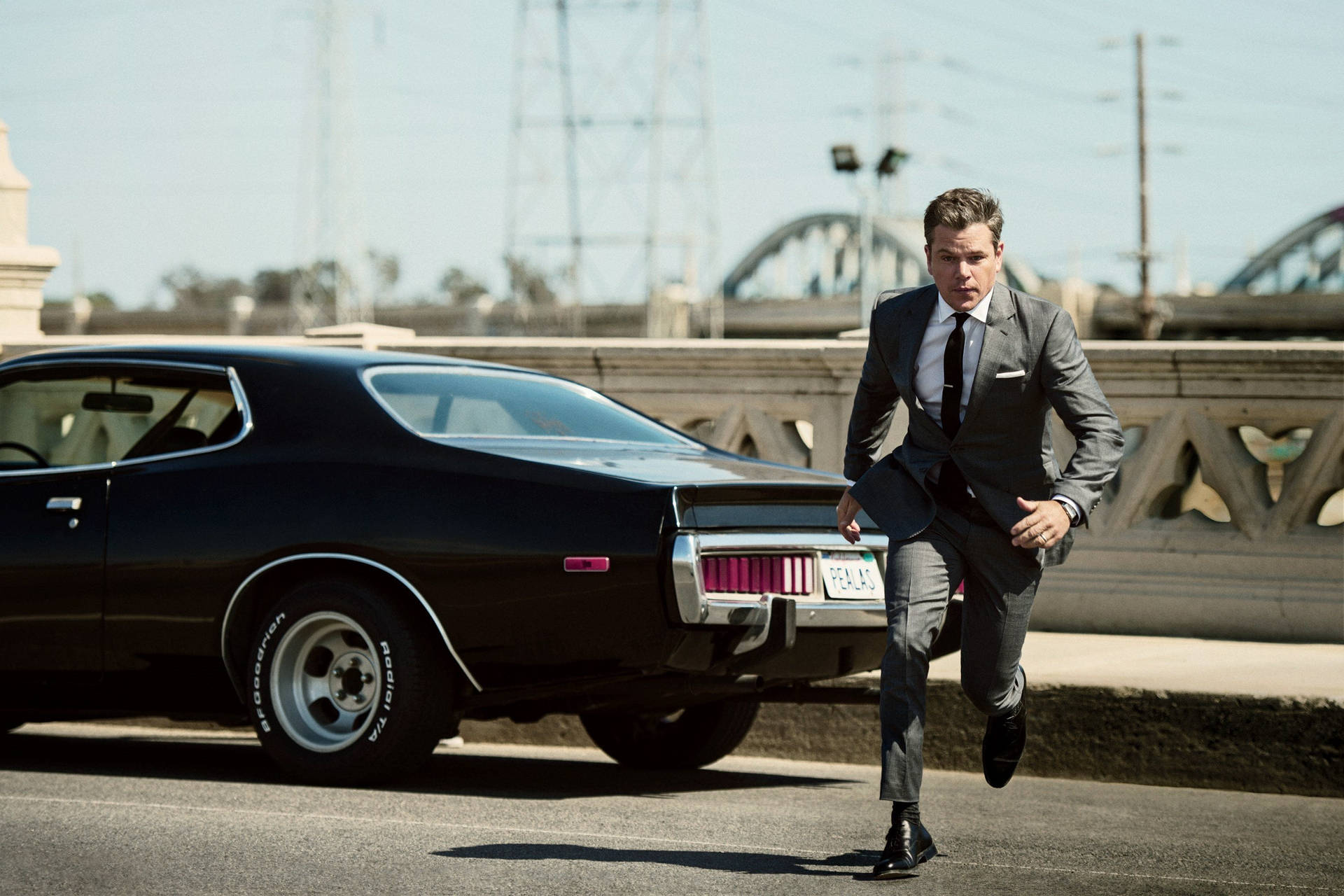 Matt Damon som Bourne i jakkesæt Tapet Wallpaper