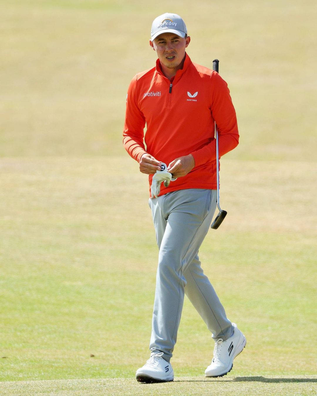 Matt Fitzpatrick iført orange golf tøj Wallpaper