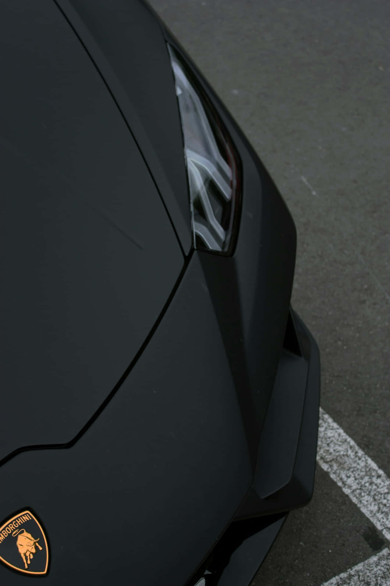 Matte Black Lamborghini Closeup Wallpaper