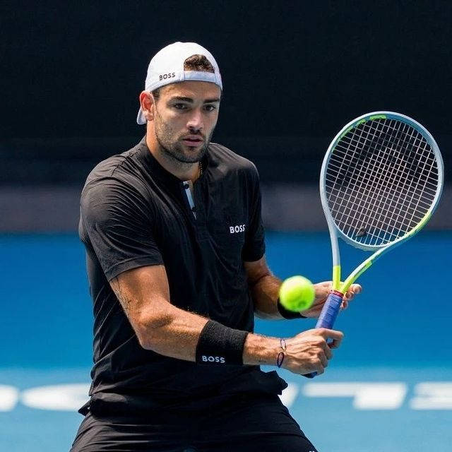Matteo Berrettini In-Action with Tennis Ball Wallpaper