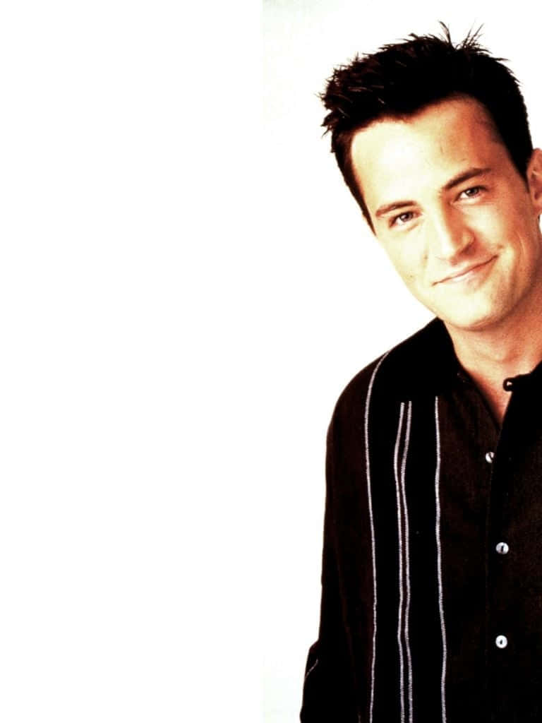 Friends For Life: Actor Matthew Perry Laughs It Up On The Stage" Wallpaper