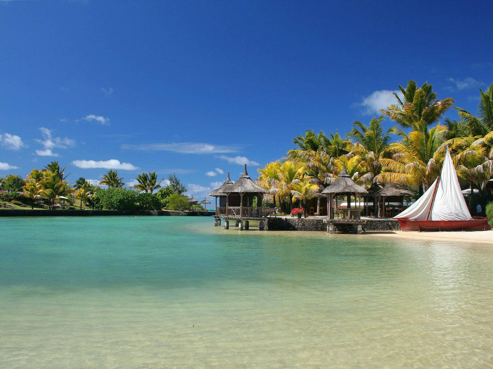 Mauritius Beach Cottages - En afslappende scene af kystlinjen Wallpaper