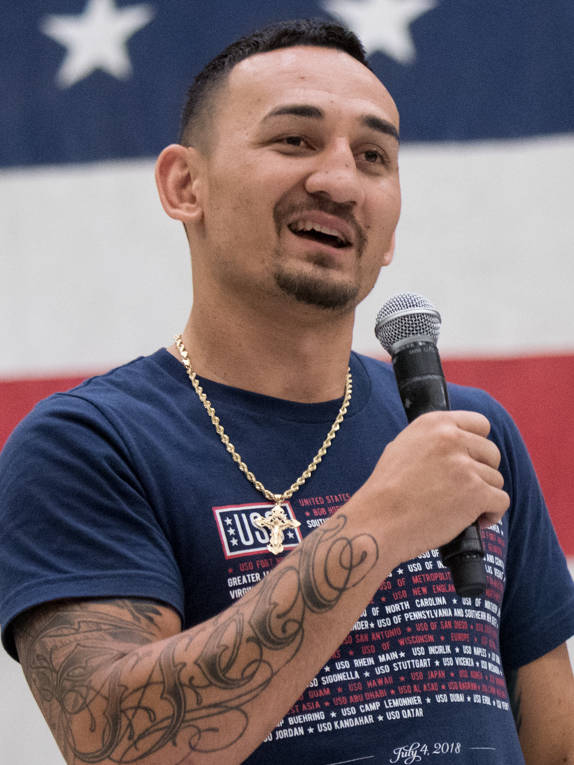 Max Holloway With Microphone Wallpaper