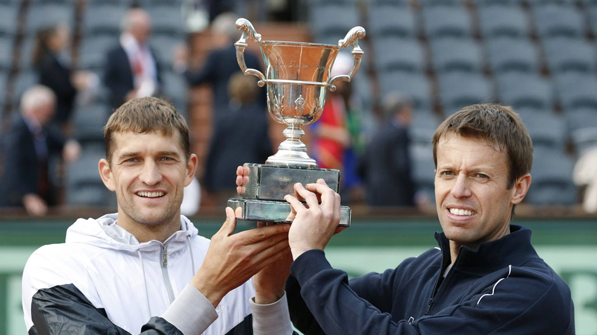 Max Mirnyi With Trophy And Partner Wallpaper
