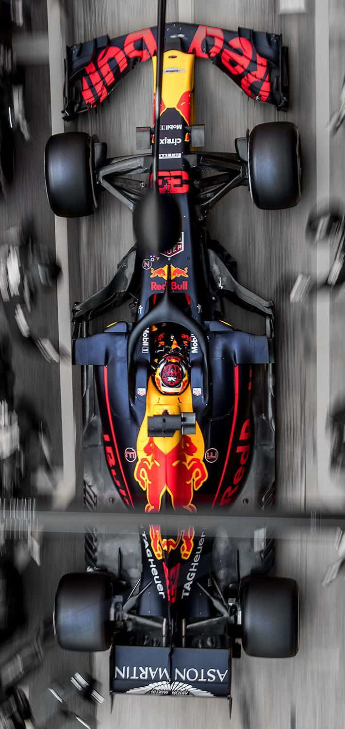 Max Verstappen racing in his Red Bull car