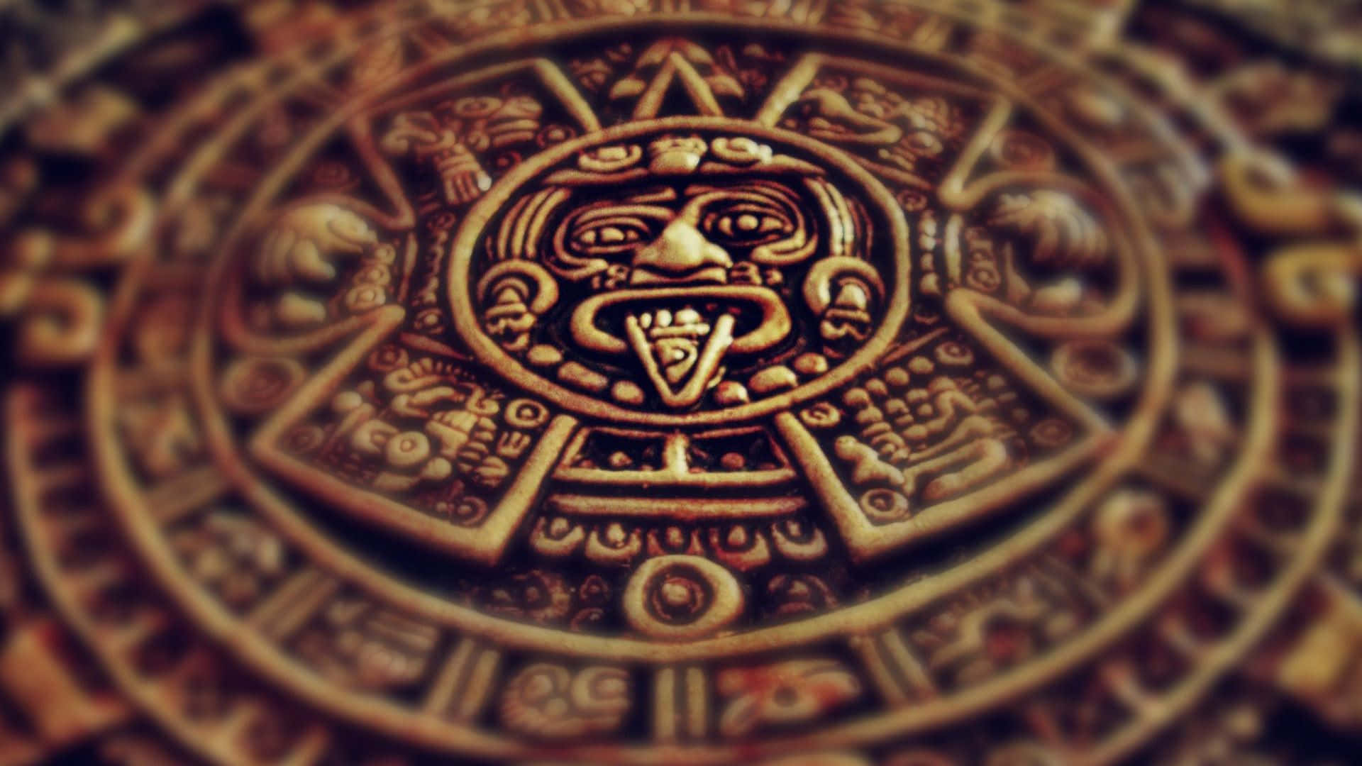 A Circular Aztec Calendar With A Sun And Moon Wallpaper
