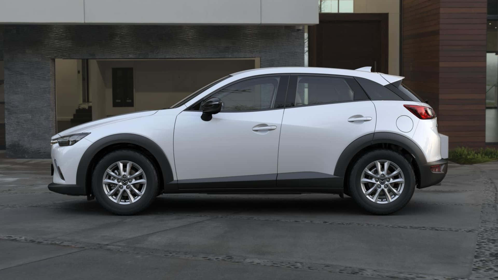 Stylish Mazda CX-3 in Urban Landscape Wallpaper