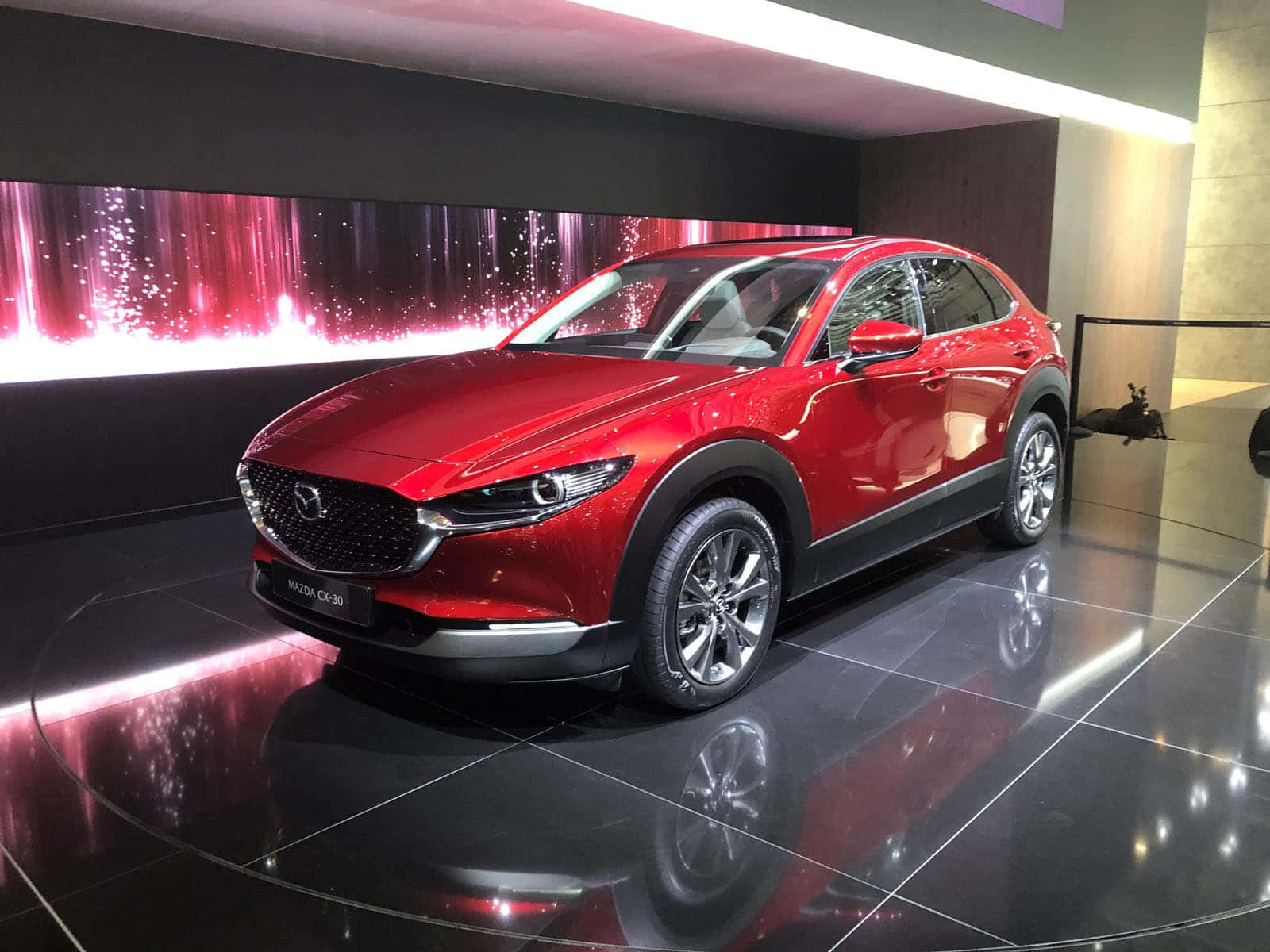 Sleek and Stylish Mazda CX-30 in Action Wallpaper