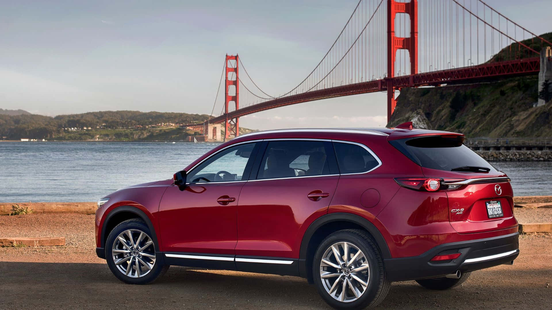 Sleek and Stylish Mazda CX-9 in Action Wallpaper