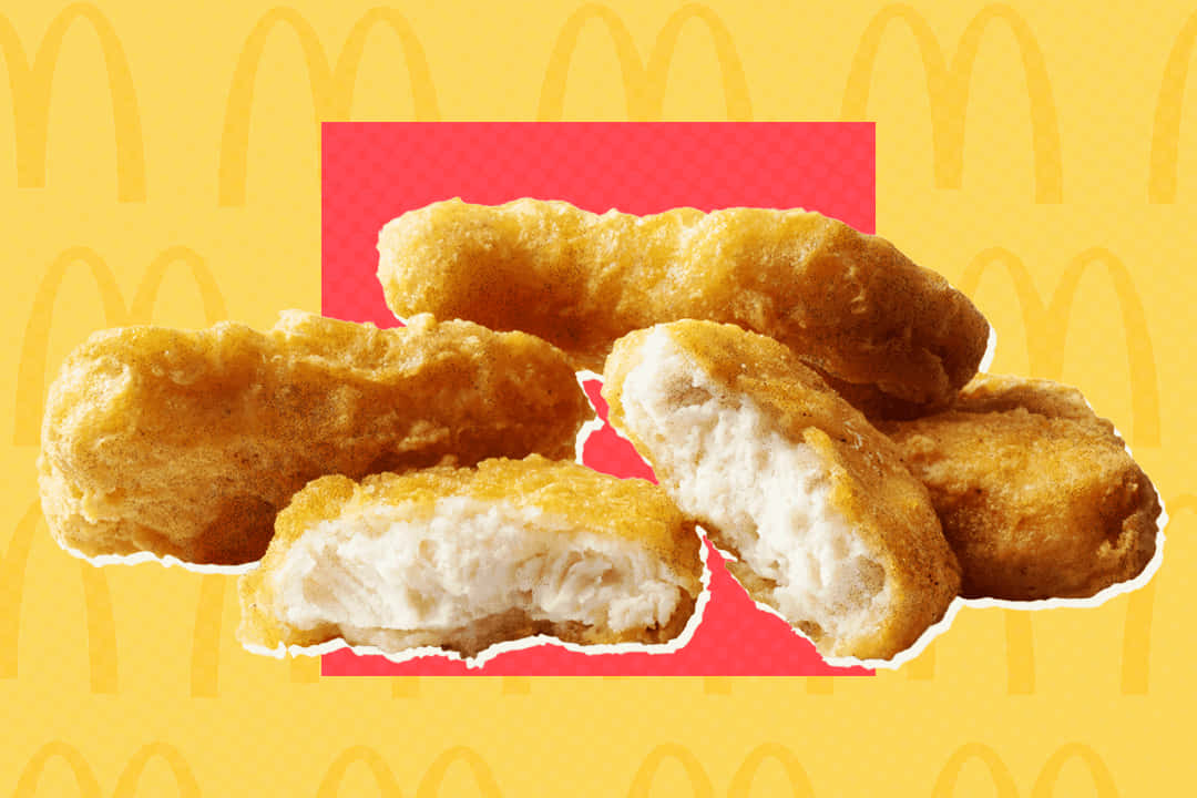 Mcdonald's Chicken Nuggets On A Yellow Background