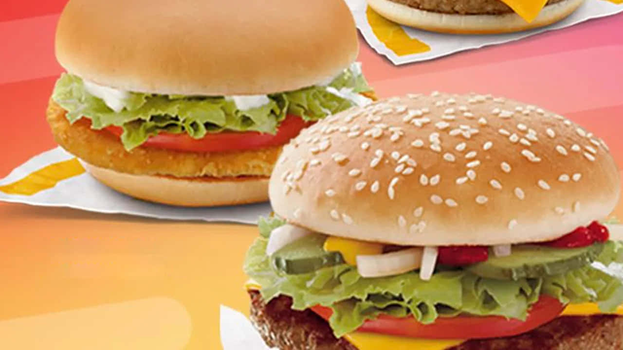Mcdonald's Burgers On A Colorful Background