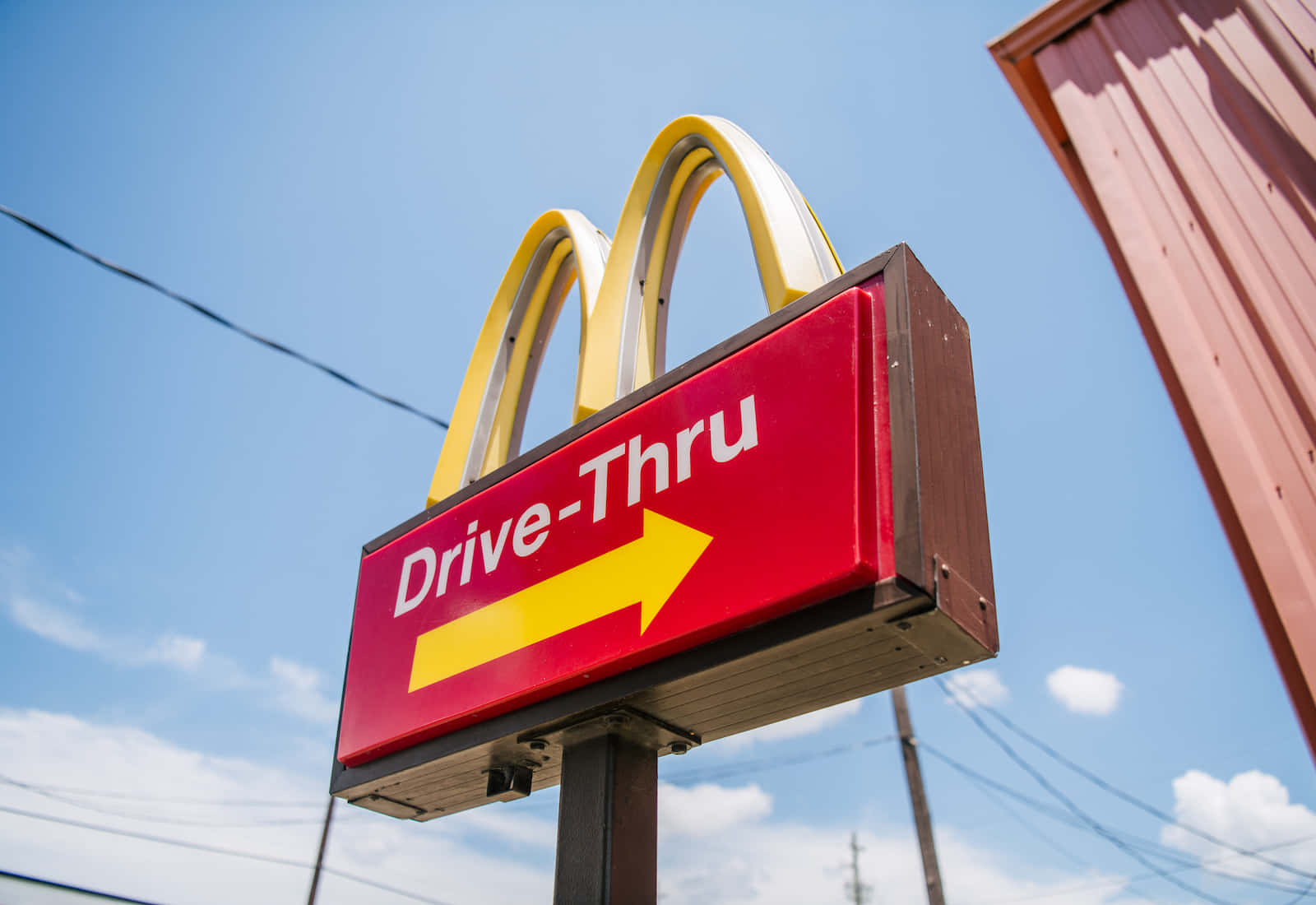 A Mcdonald's Drive Thru Sign Is Shown