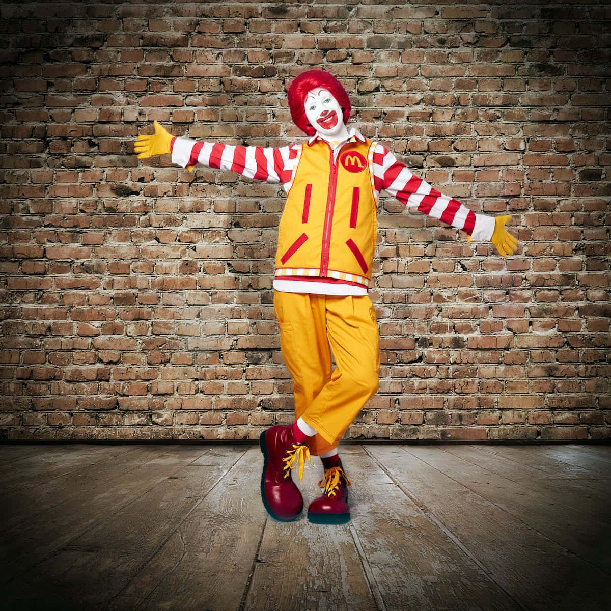 A Mcdonald's Clown In A Red Outfit