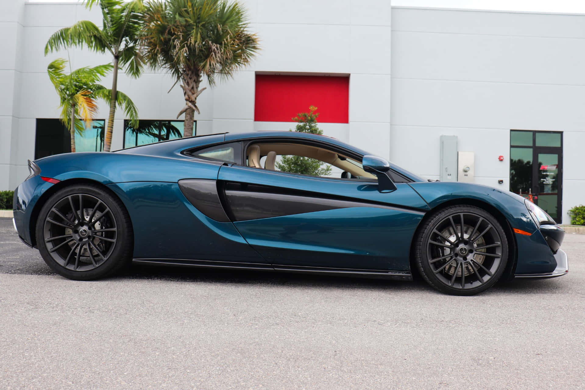 Mclaren 570gt In Volle Snelheid Achtergrond