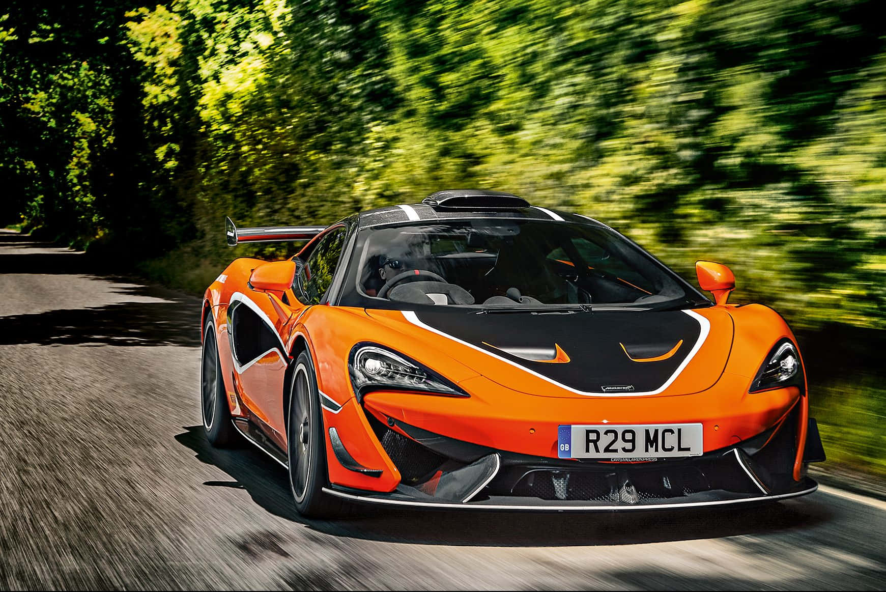 Sleek and Powerful McLaren 620R on the Track Wallpaper
