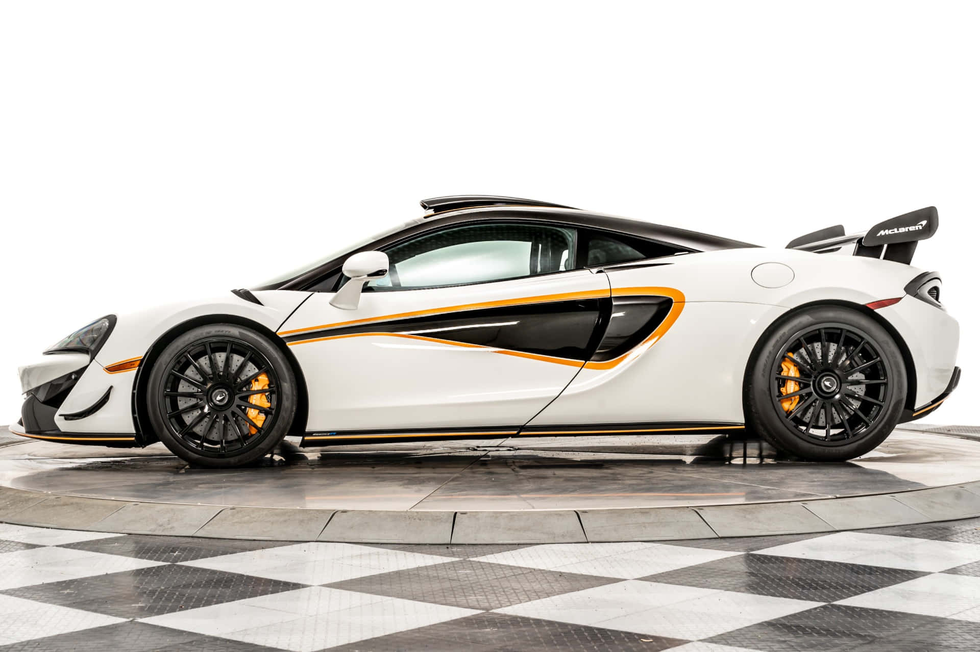 Sleek and Powerful McLaren 620R on the Road Wallpaper