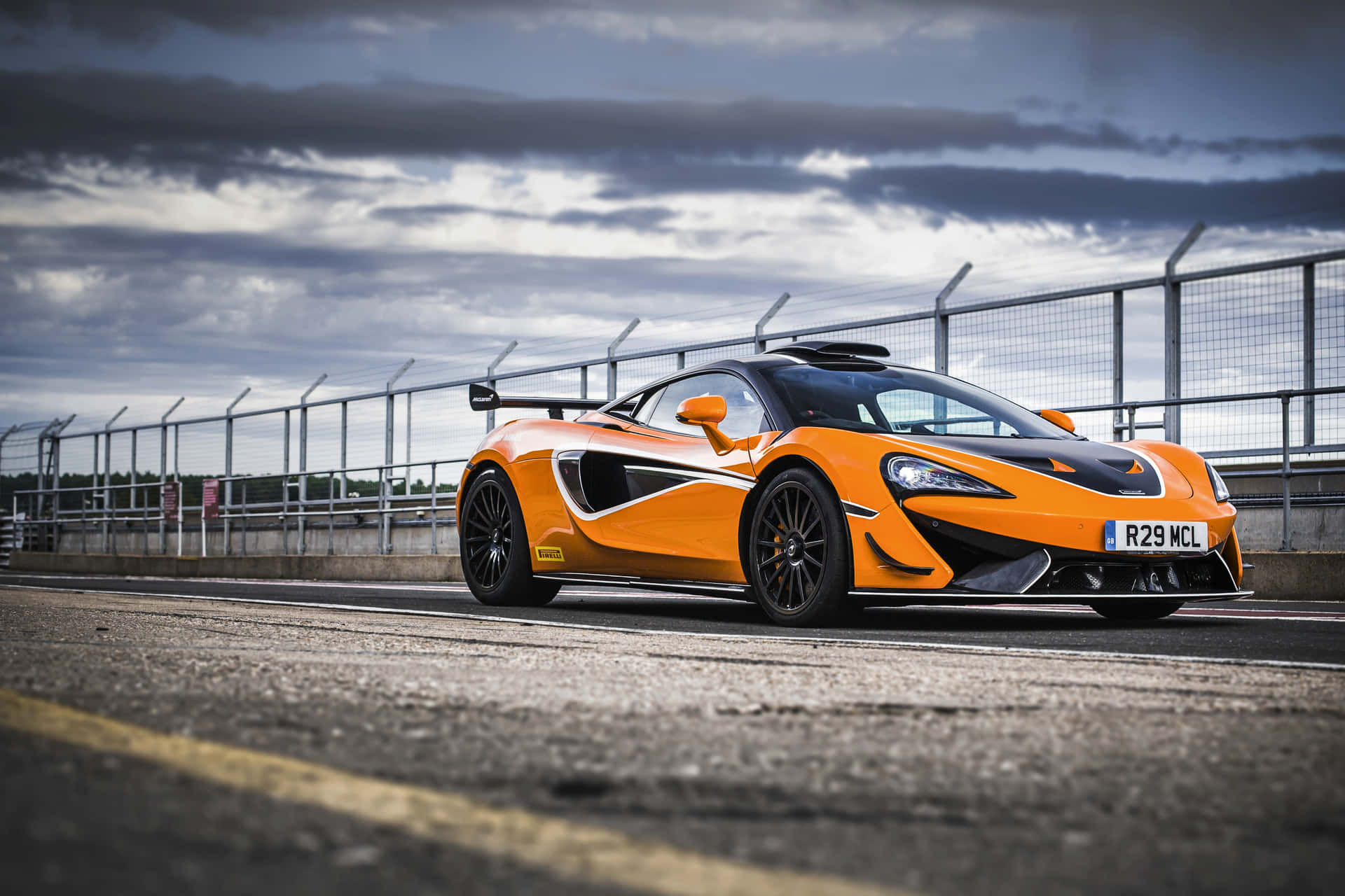 Vibrant McLaren 620R on the track Wallpaper