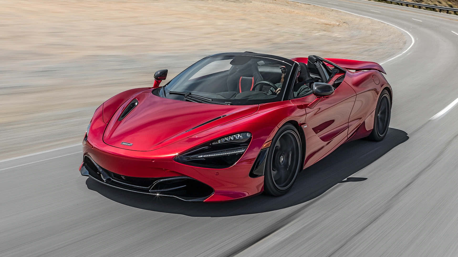 Mclaren 720s Spider Op Open Weg Achtergrond