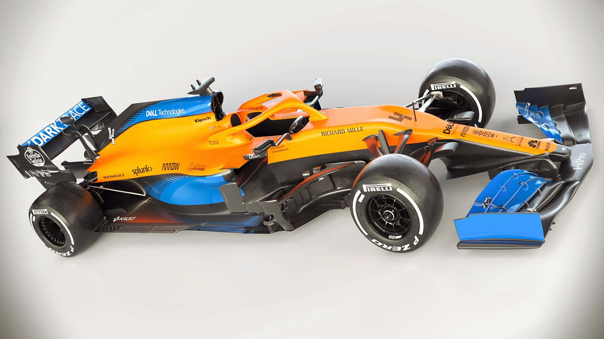 McLaren Formula 1 Racecar tearing up the track Wallpaper