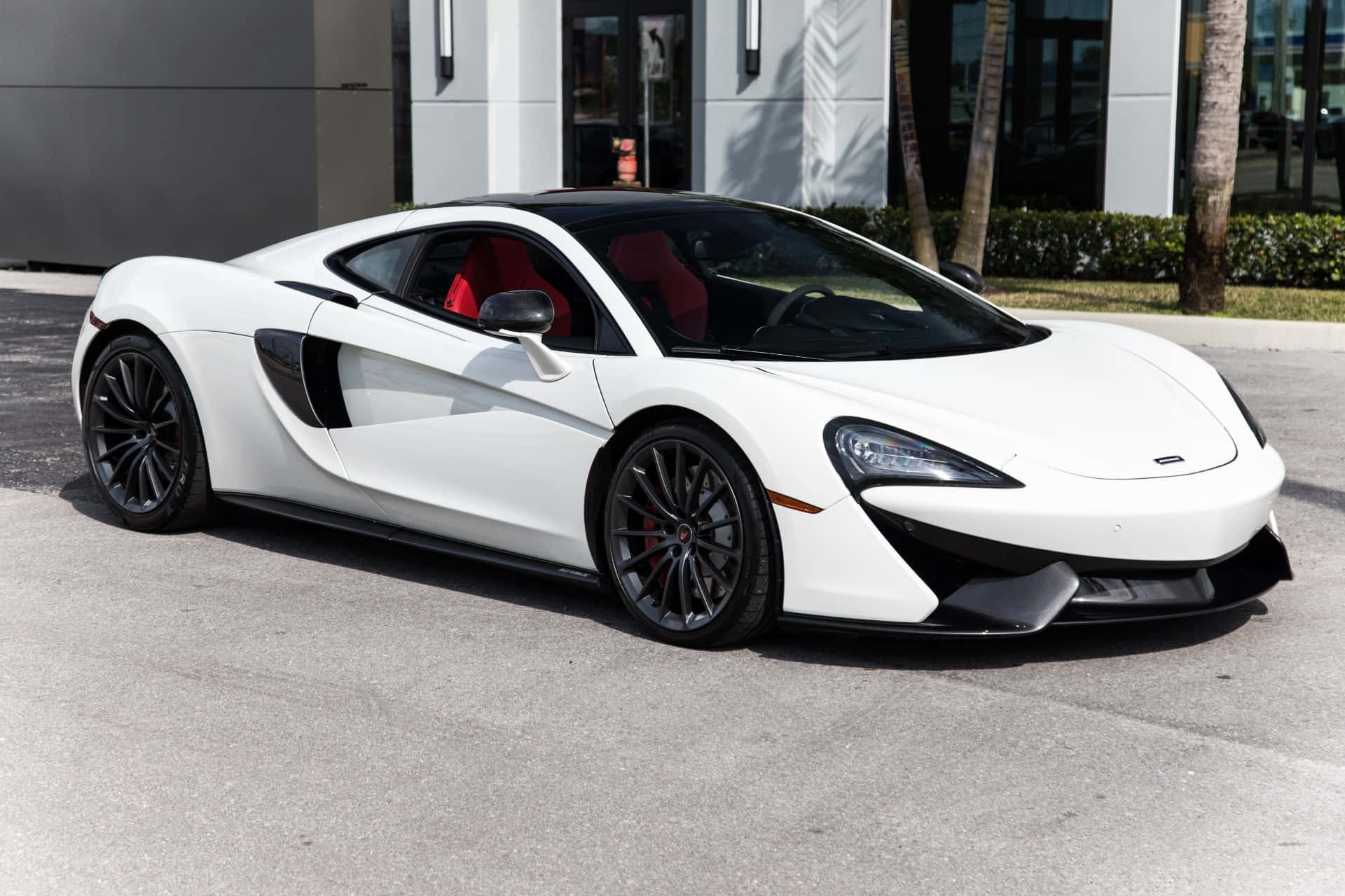 Sleek and Majestic McLaren GT on Open Road Wallpaper