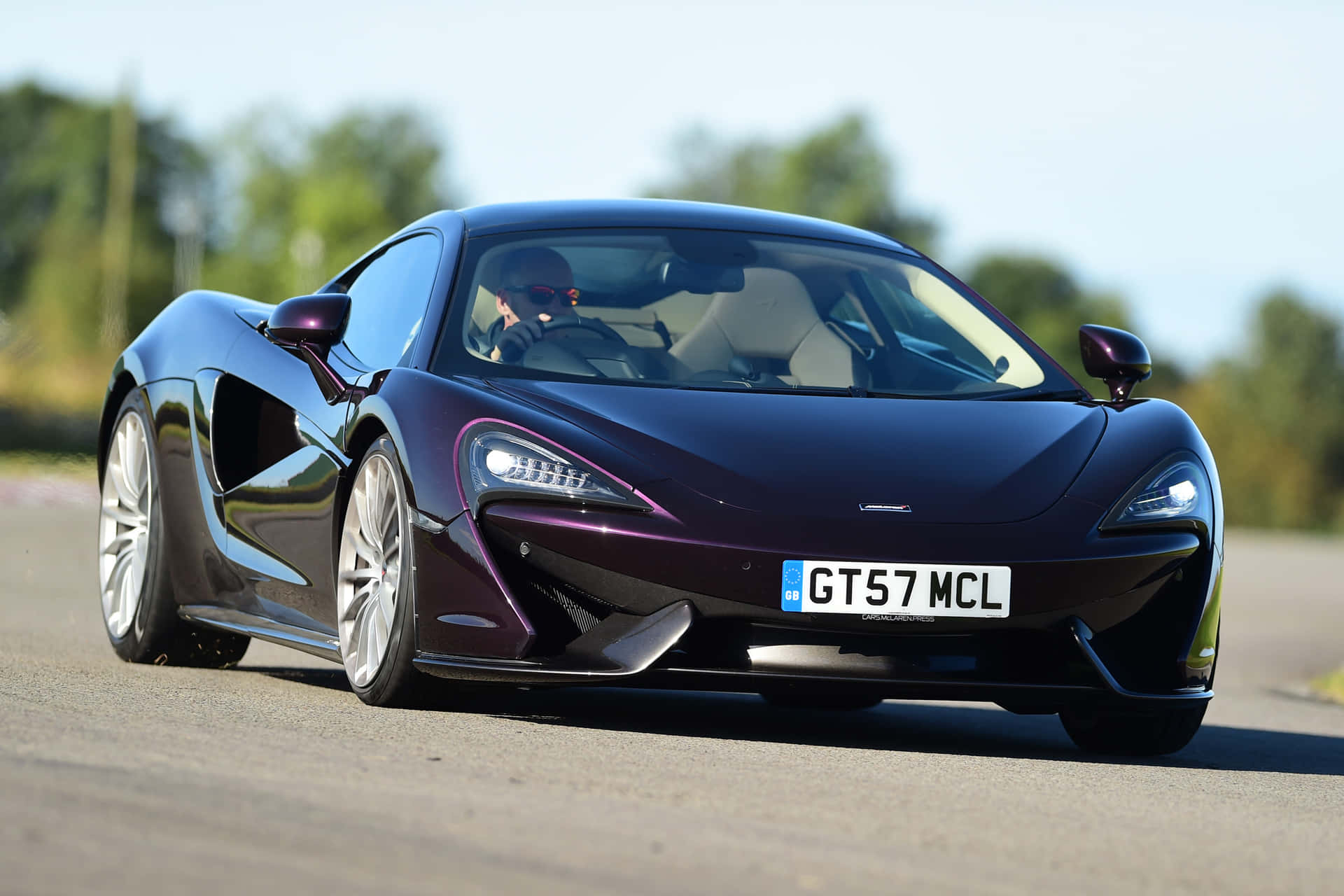 Stunning McLaren GT on an open road Wallpaper