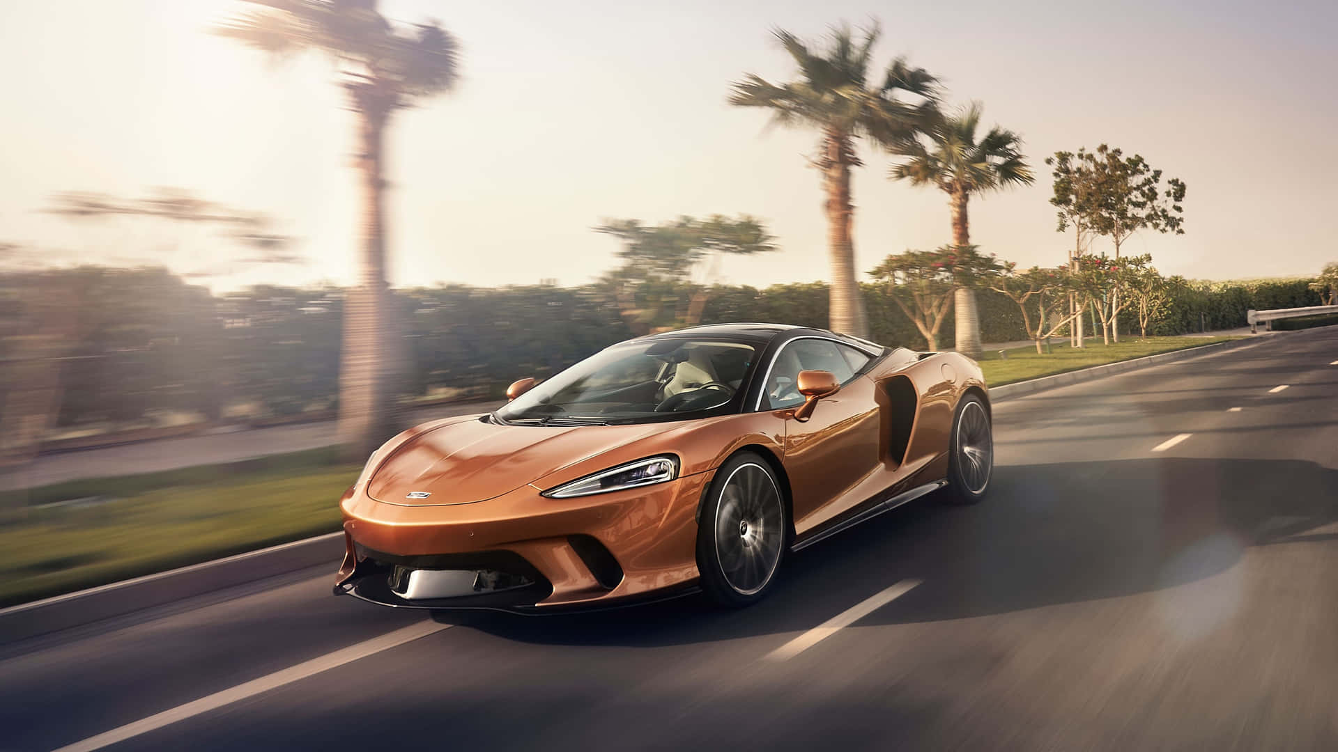 Stunning McLaren GT cruising down the open road Wallpaper