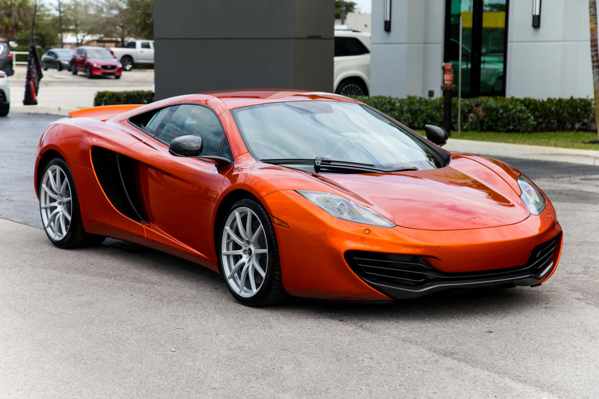 Mclaren Mp4-12c Cruising On The Open Road Wallpaper