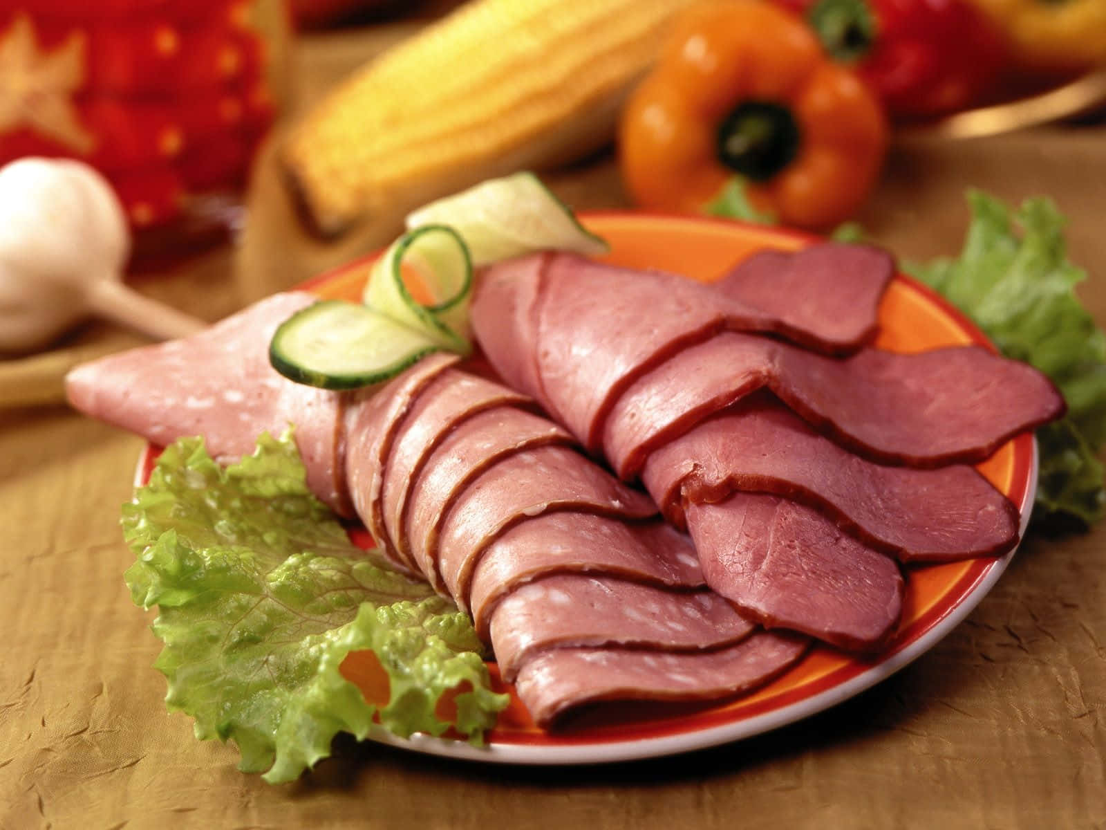 Sliced Ham On A Plate With Vegetables