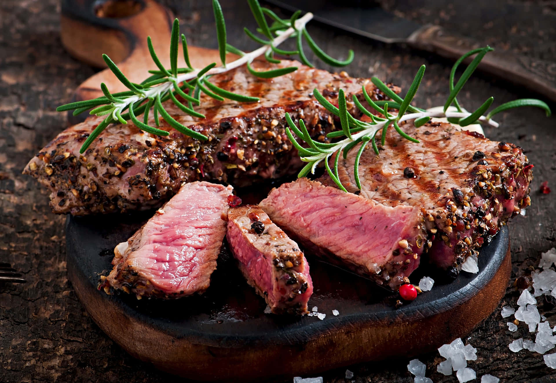 Steak On A Plate With Rosemary Sprigs