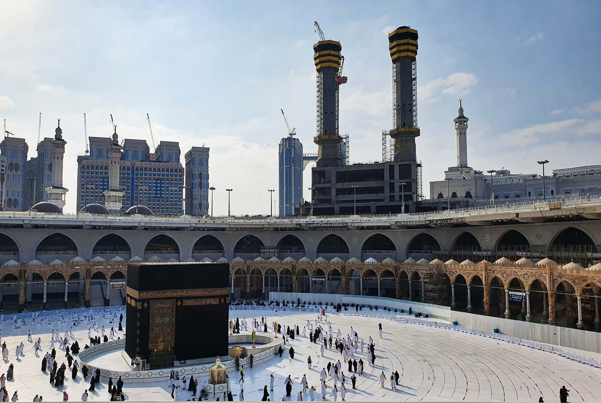 A Large Kaaba In Front Of A City