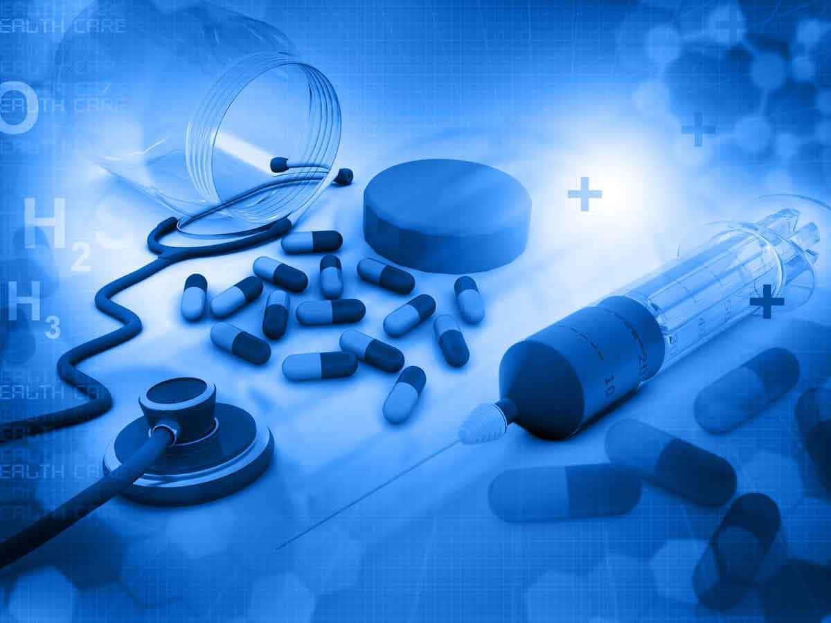 Enmedicinteknisk Apparat Och Piller På En Blå Bakgrund