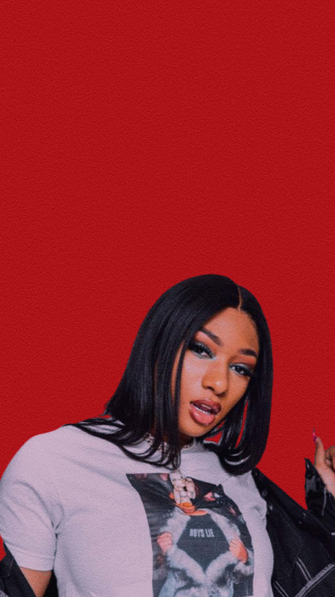 Megan Thee Stallion radiating confidence in an elegant outfit.