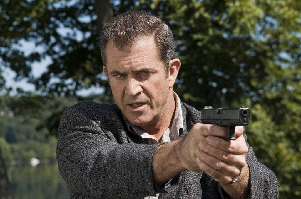 Mel Gibson Holding Gun