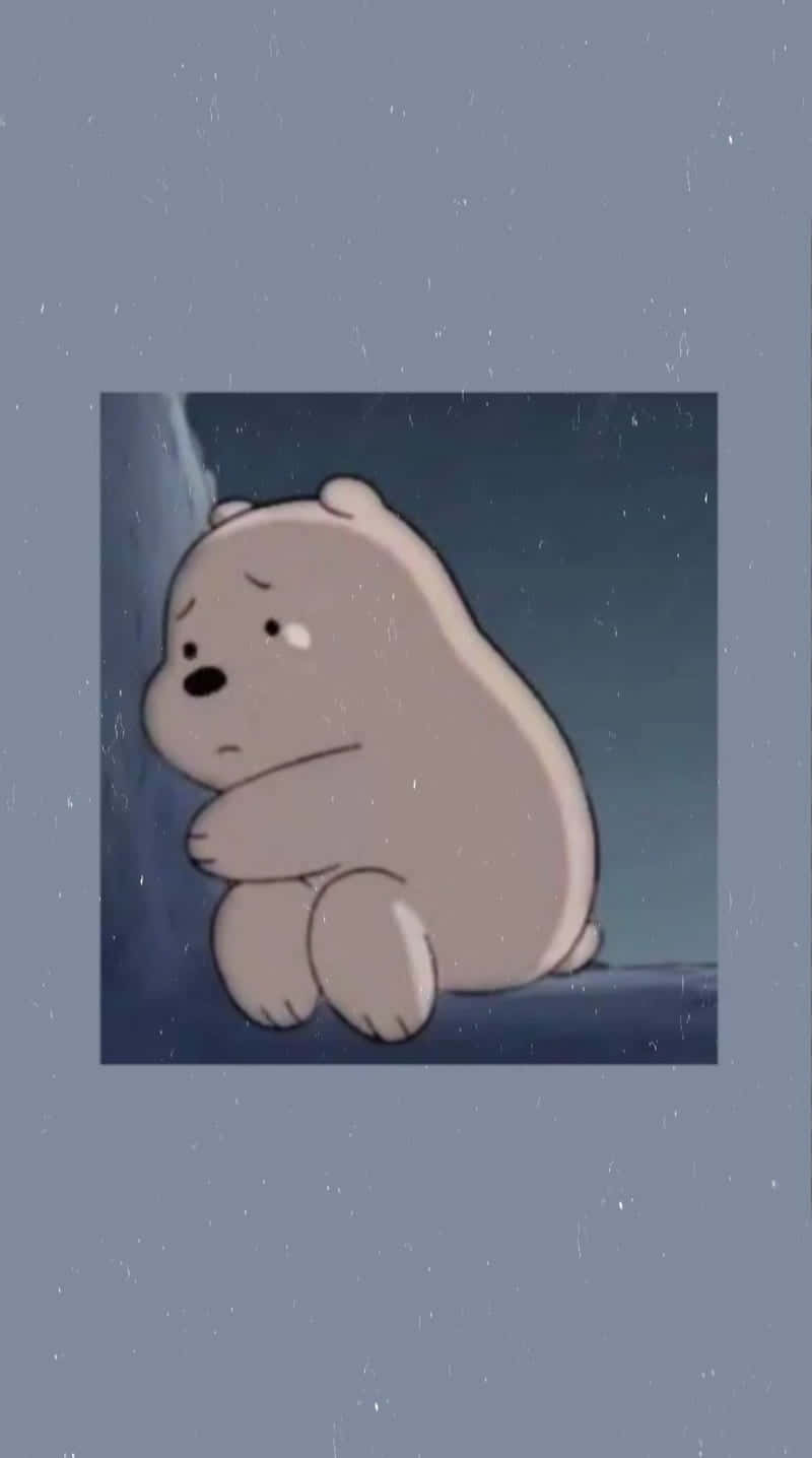 Melancholic Cartoon Bear Sitting Alone.jpg Wallpaper