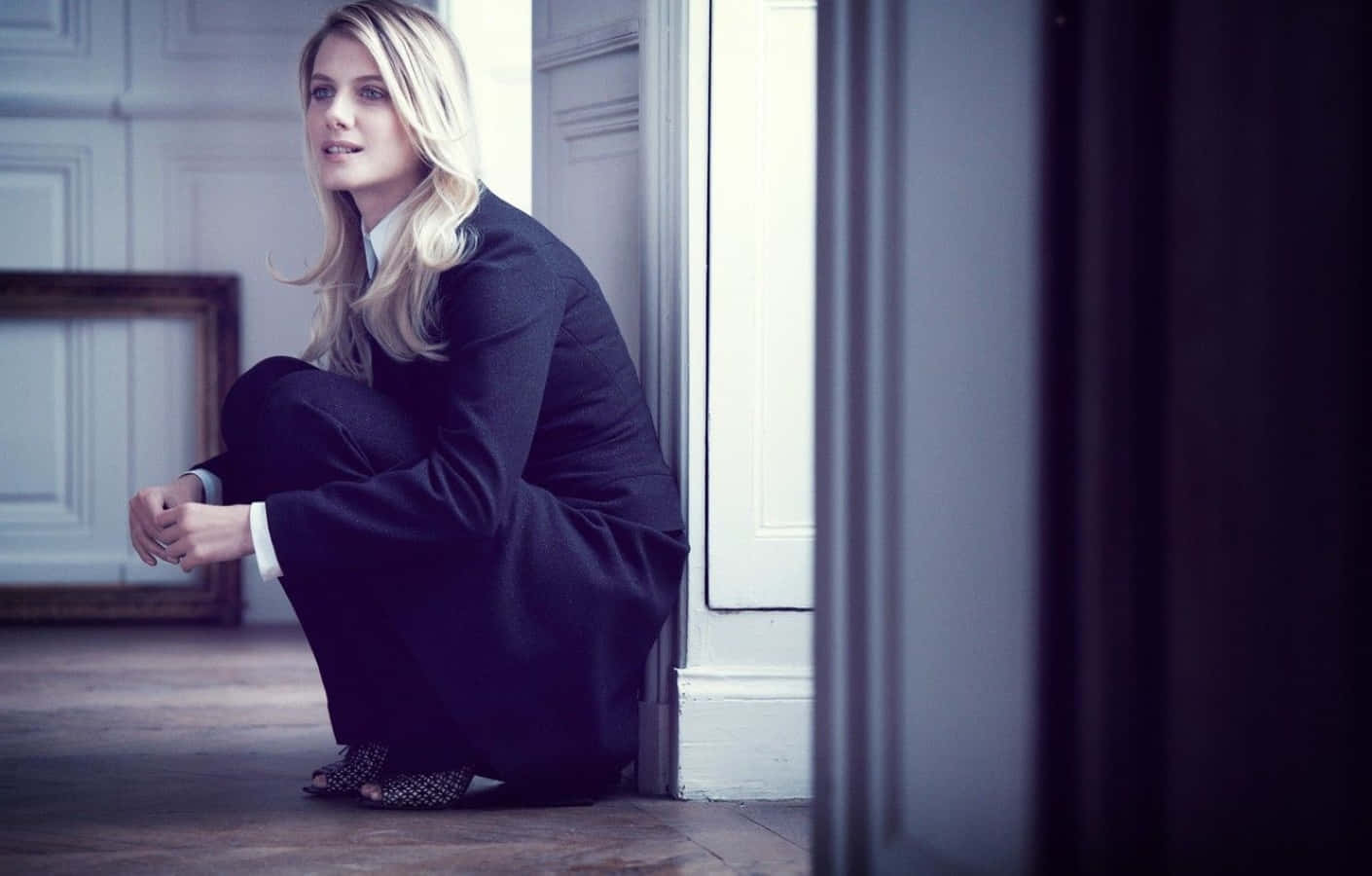 Mélanie Laurent posing elegantly in a natural setting Wallpaper