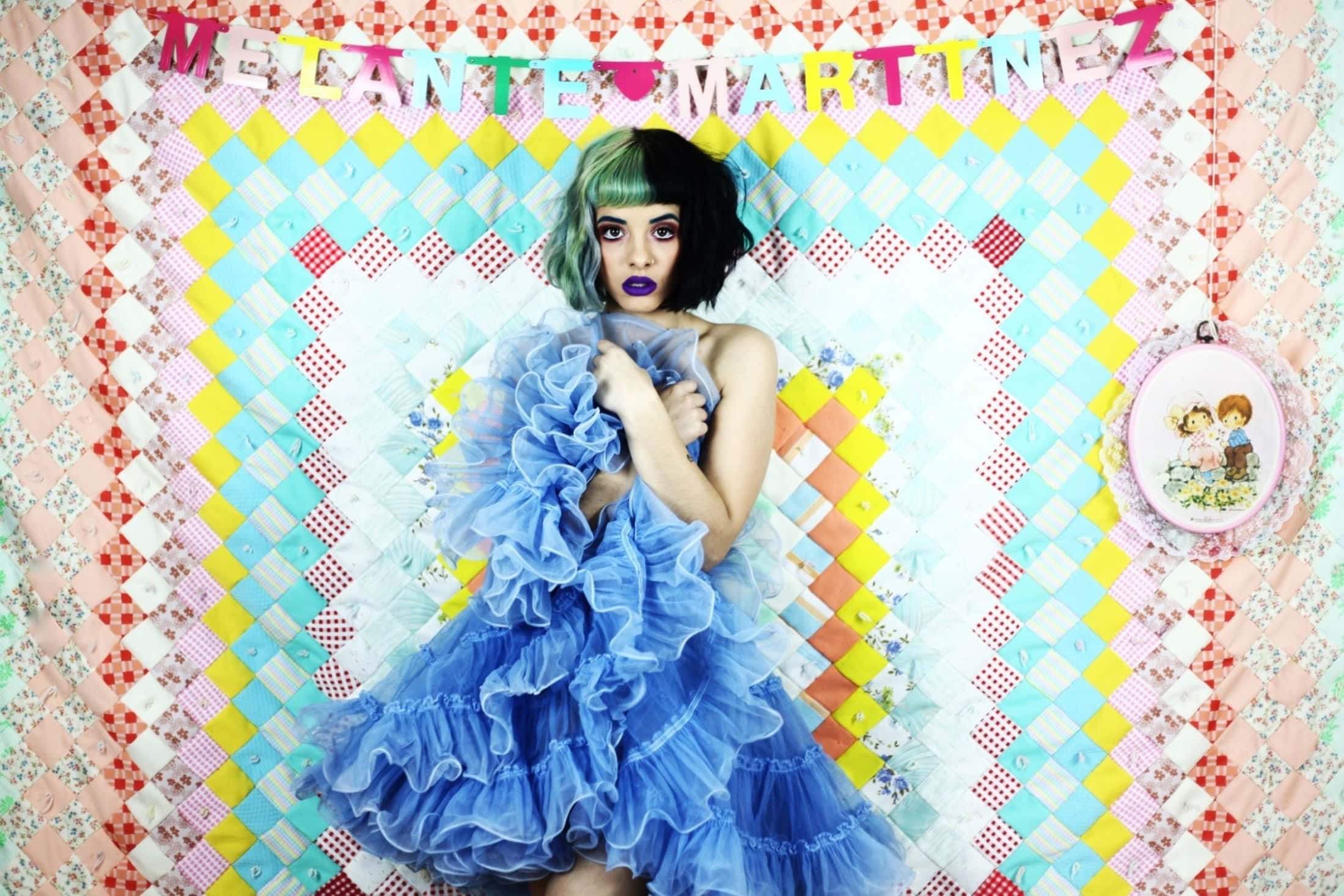 Melanie Martinez performing on stage in her signature style