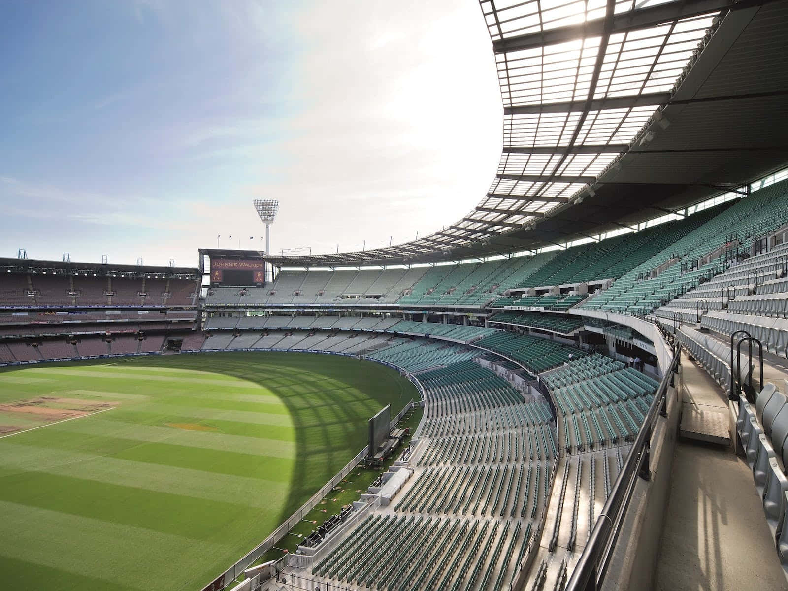 Melbournen Krikettistadion Tyhjillään Auringonnousussa Taustakuva