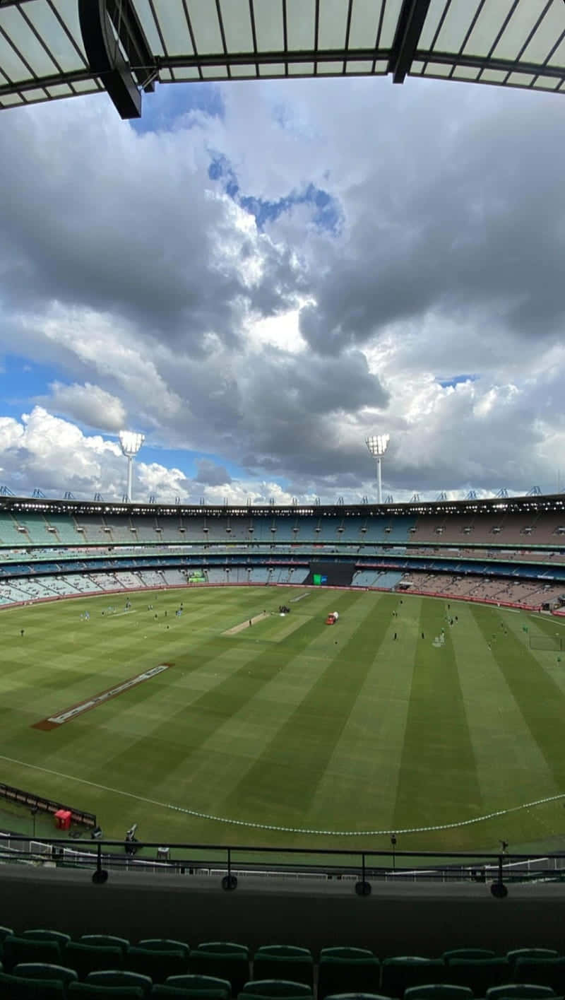 Melbourne Cricket Ground Onder Bewolkte Luchten Achtergrond