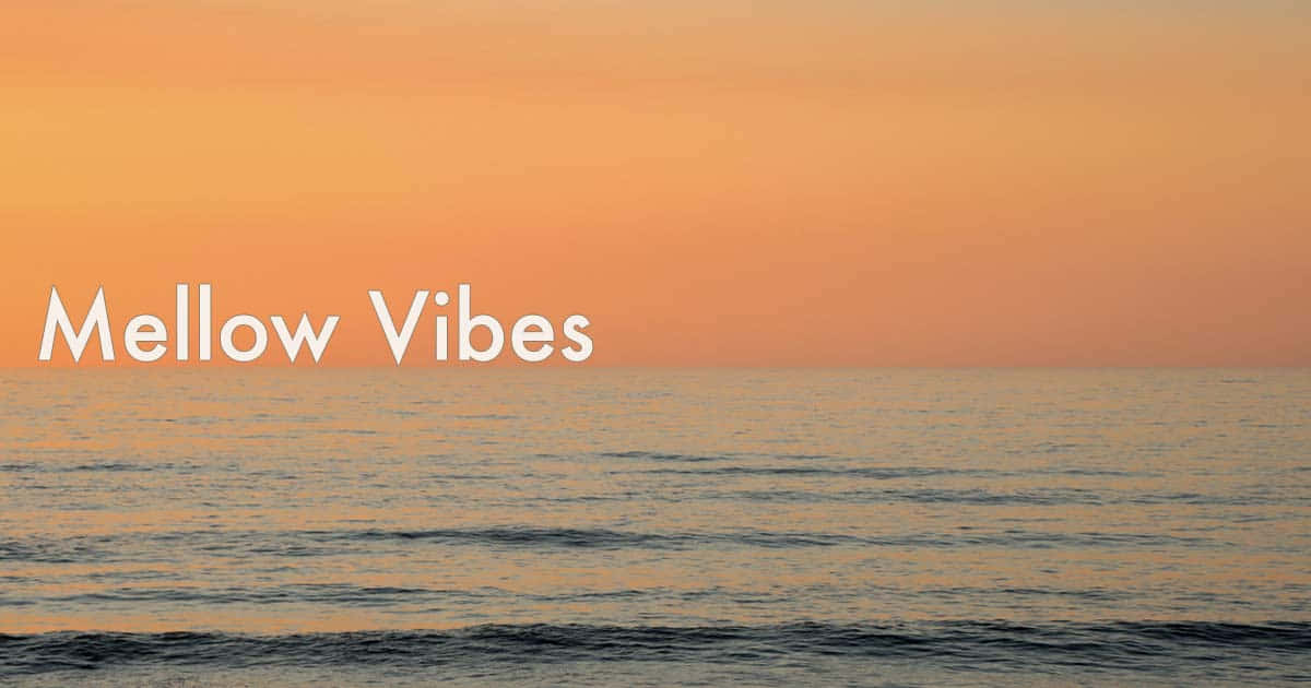 Mellow Vibes Text On A Beach Sunset Photo Wallpaper