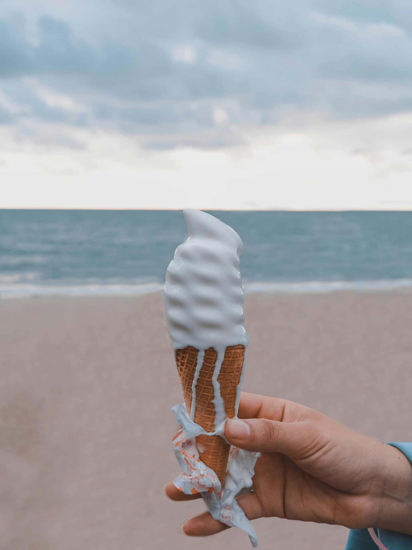 Melting Vanilla Ice Cream Cone Beach Backdrop Wallpaper