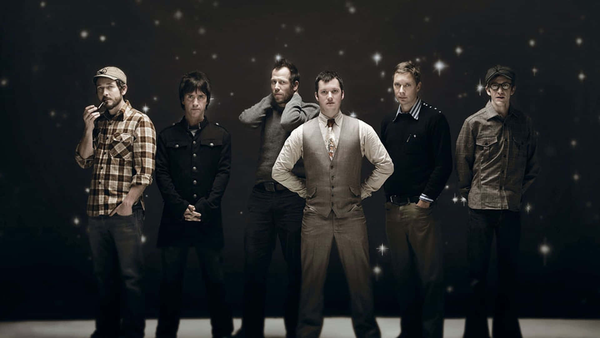 Members Of Modest Mouse Standing Together Wallpaper
